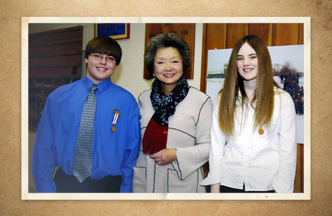 Former Governor General of Canada, Adrienne Clarkson stands between students Matt Sexton and Amber Vasser, 1985.