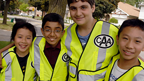 CAA School Safety Patrollers wearing CAA vests ready to make community safe.